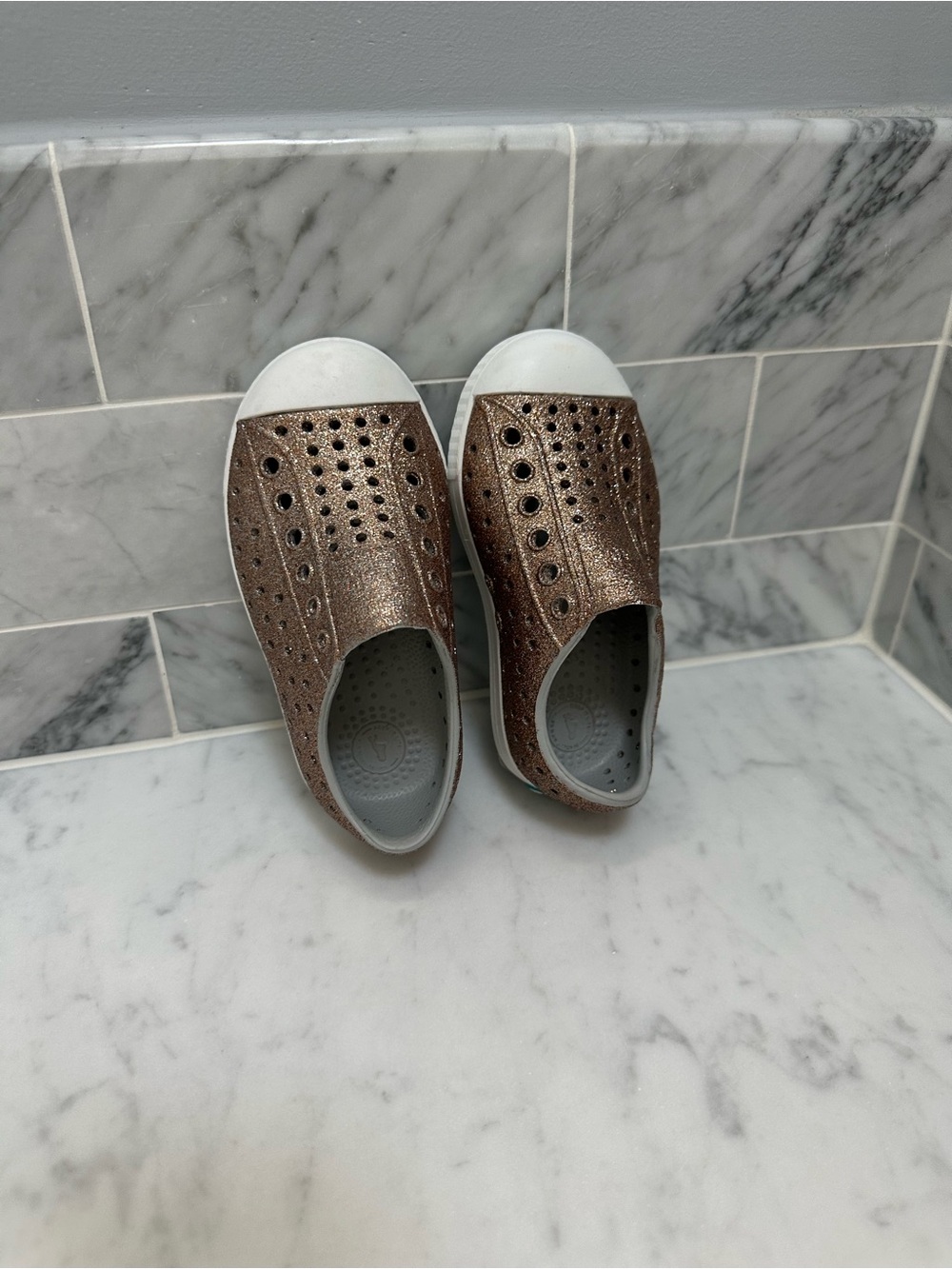 Native Shoes Kids Slip-On Sneakers in Metallic - Rose gold